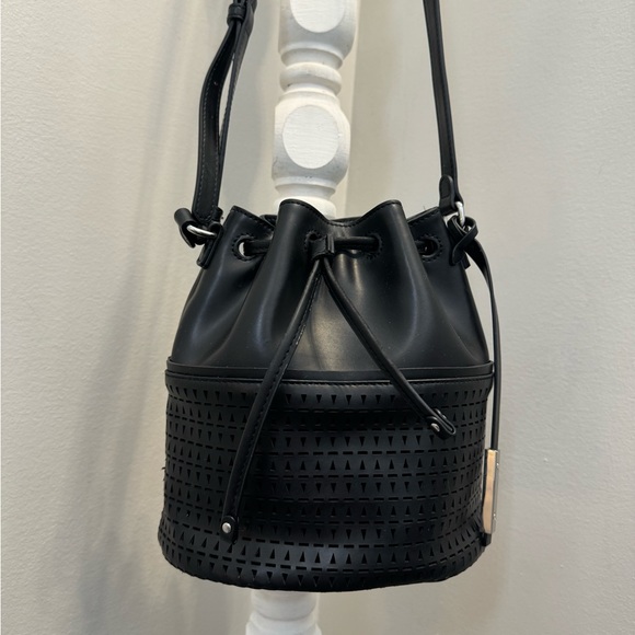 Vince Camuto Handbags - Vince Camuto Black Leather Drawstring Laser Cut Bag